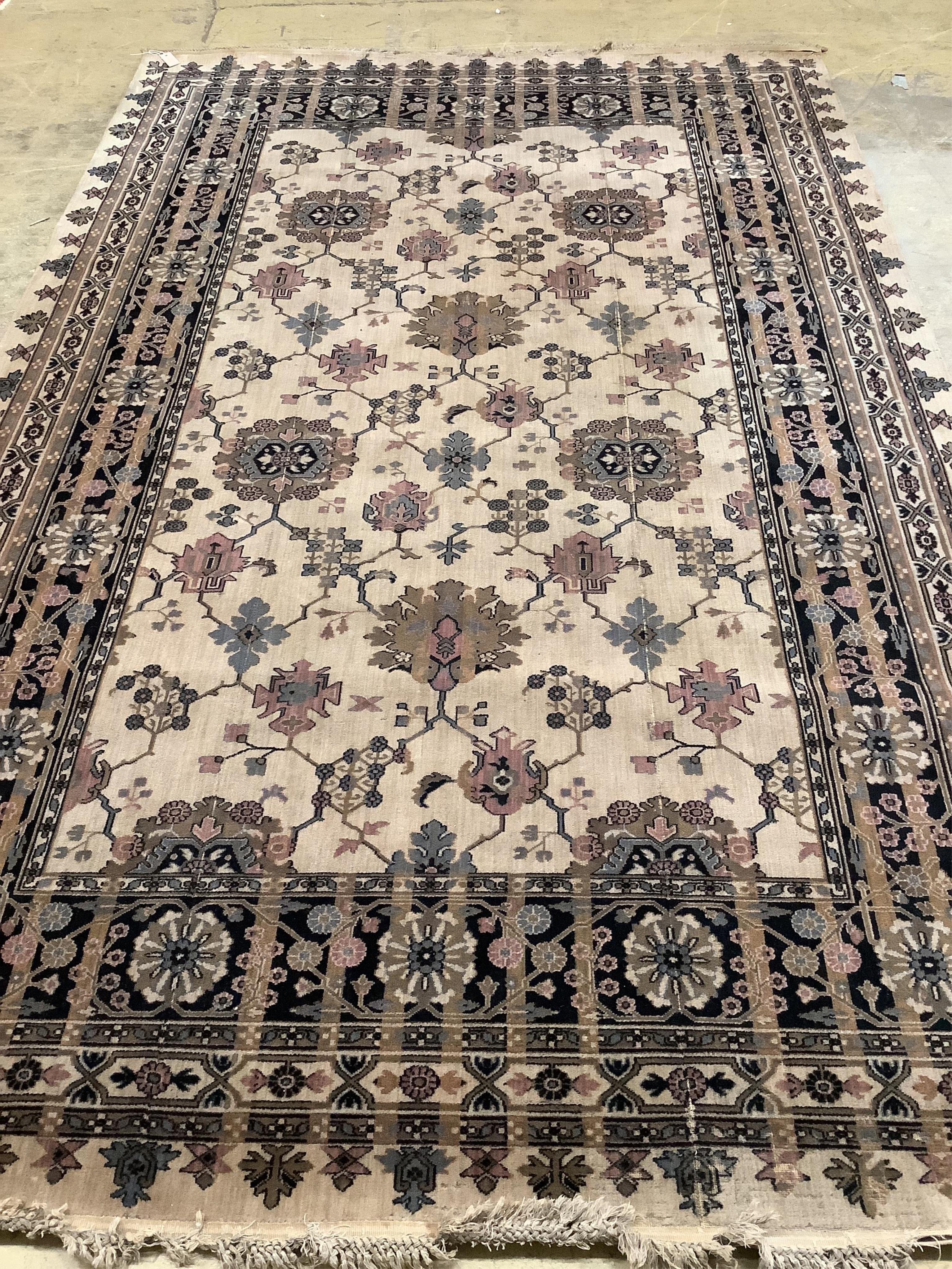 A Hamadan ivory ground carpet, 325 x 205cm